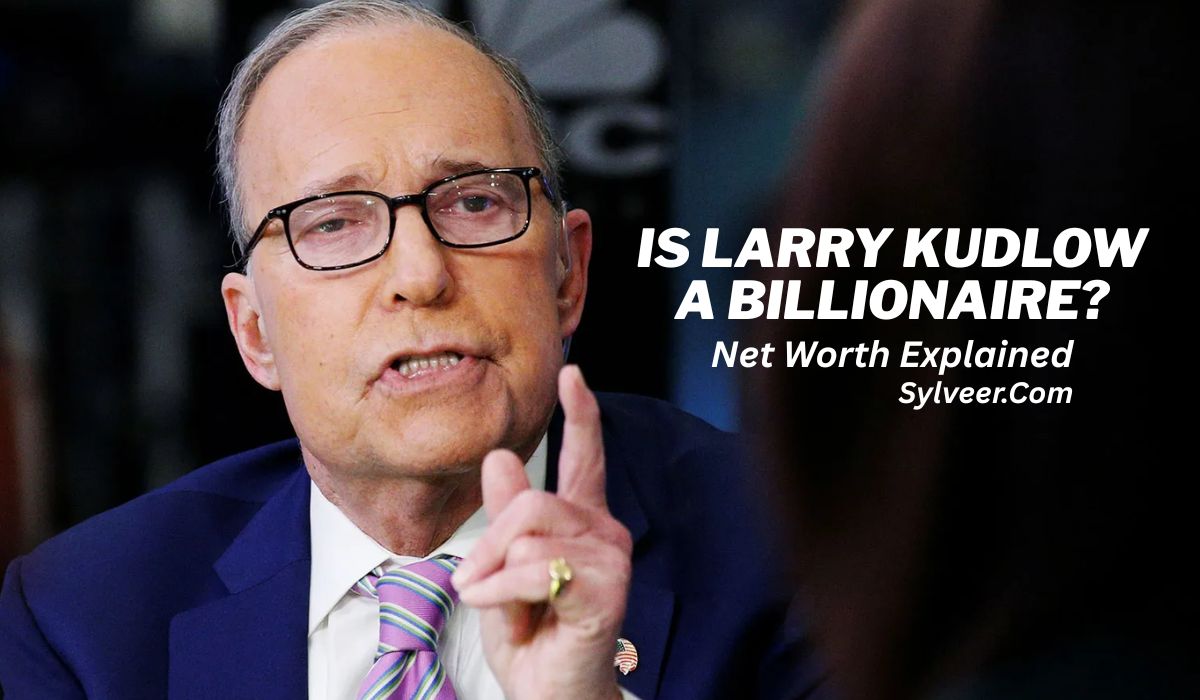 "Larry Kudlow speaking and gesturing with his hand while wearing a suit and striped tie. Text overlay reads: 'Is Larry Kudlow a Billionaire? Net Worth Explained - Sylveer.Com'."