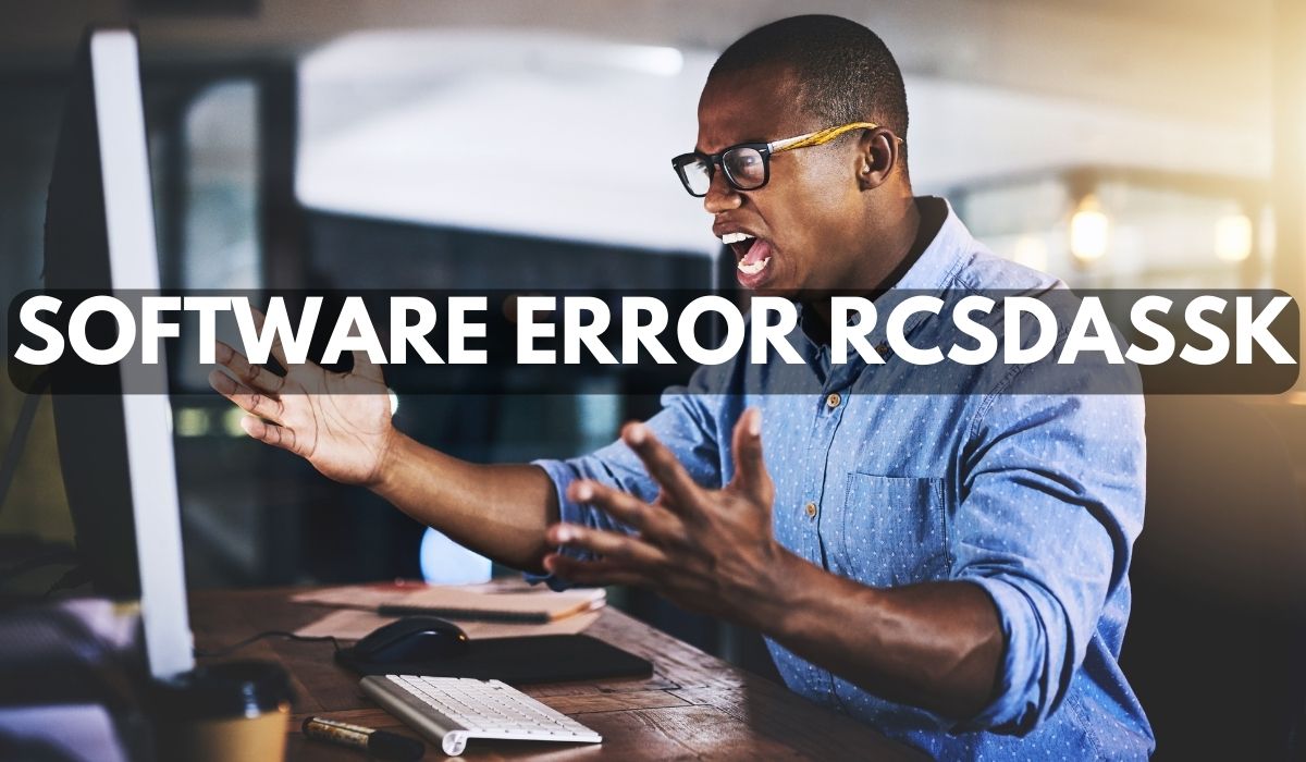 Frustrated man shouting at computer screen with bold text overlay “Software Error RCSDASSK”.