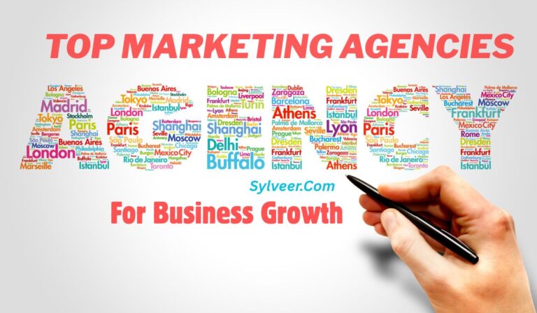 “Top Marketing Agencies for Business Growth – colorful word cloud spelling ‘AGENCY’ with global city names and a hand holding a pen, featuring Sylveer.com branding.”