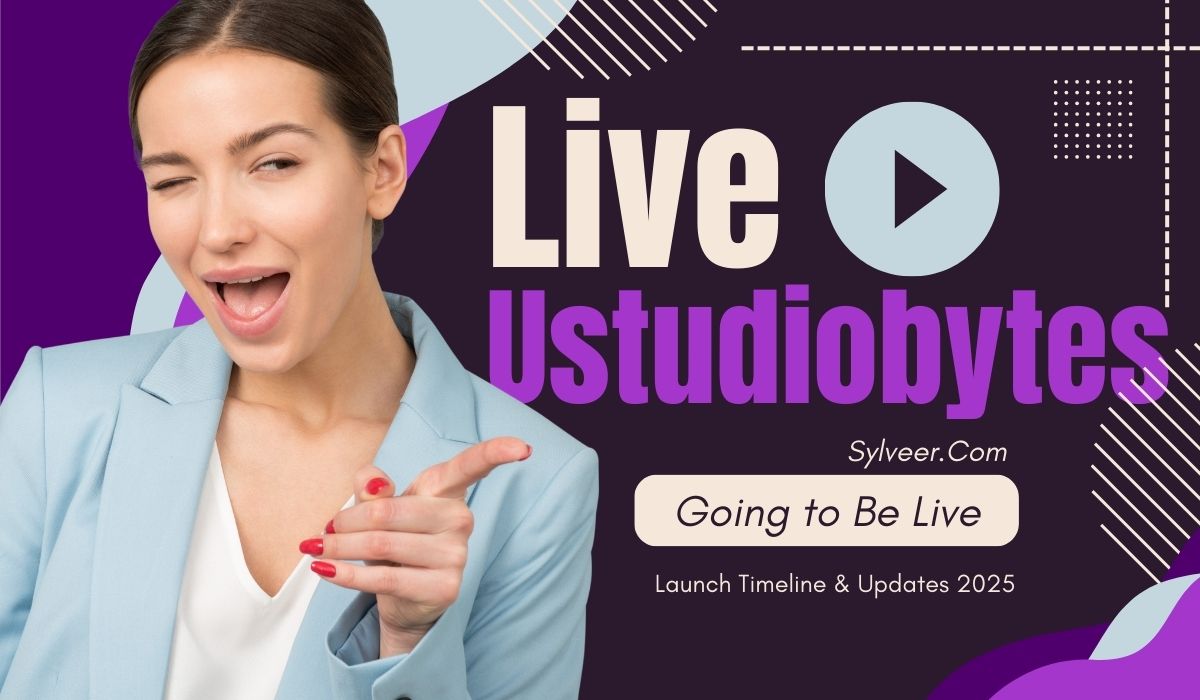 A promotional banner featuring a cheerful woman in a light blue blazer winking and pointing. The text reads: "Live Ustudiobytes – Sylveer.com – Going to Be Live – Launch Timeline & Updates 2025." Visual elements include bold purple and beige fonts with a play button icon. Keyword: when is ustudiobytes going to be live.