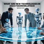 A group of business professionals sit around a futuristic holographic table displaying digital data, while several humanoid robots stand beside them. The text at the top reads “WHAT ARE NEW TECHNOLOGIES IN 2023 FEEDWORLDTECH” with “Sylveer.com” underneath.