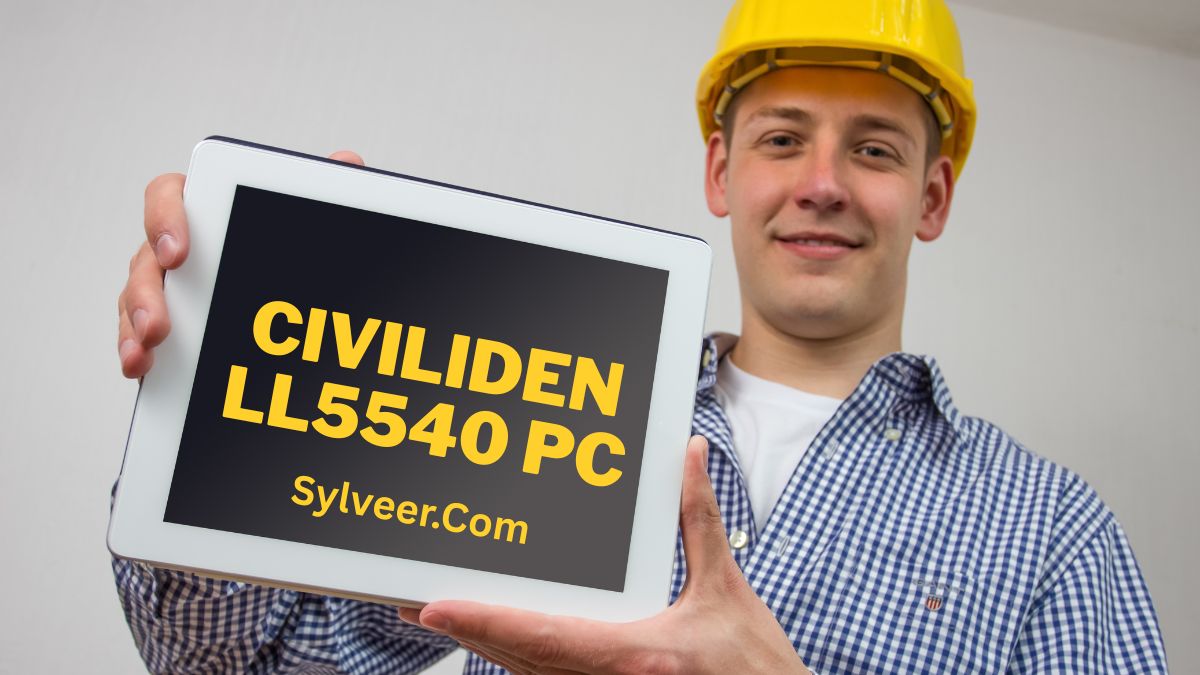 A construction worker wearing a yellow safety helmet smiles while holding a tablet displaying the text “CIVILIDEN LL5540 PC” and “Sylveer.com” in bold yellow letters.